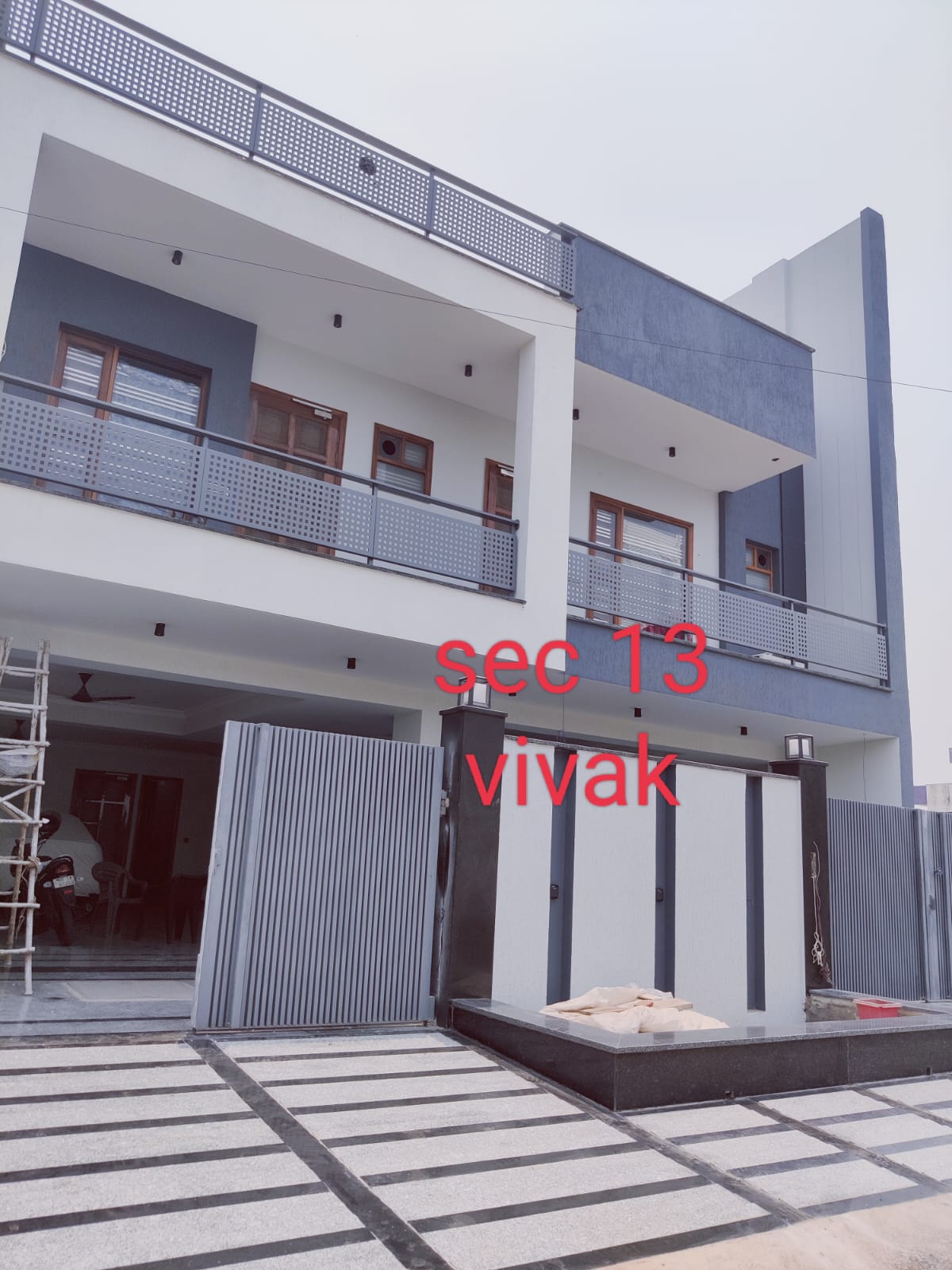Modern residence exterior with grey and white finish